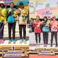 

Atlet Sumut diatas podium meraih medali emas
