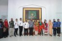 Kepala Perwakilan BKKBN Provinsi Sumatera Utara, Dr Mahyuzar, bersama Bupati Langkat, H. Syah Afandin, jajaran Pemerintah Kabupaten Langkat, Population Service International (PSI), serta Yayasan Cipta. (Foto: Diva Suwanda)