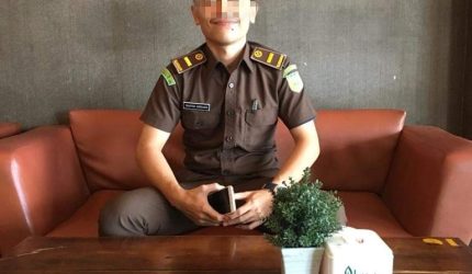 Oknum ASN Kejati Riau TG yang diduga melakukan penipuan senilai Rp2,3 M. (Foto: Diva Suwanda)